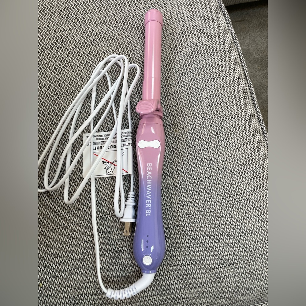 The Beachwaver B1 Rotating Curling Iron in color Pink Sunset